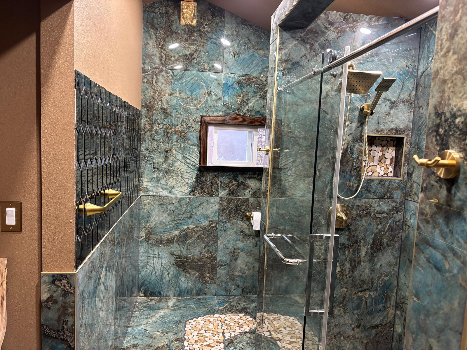 Custom tiled walk-in shower remodel by JLY Constructions in Marysville, WA